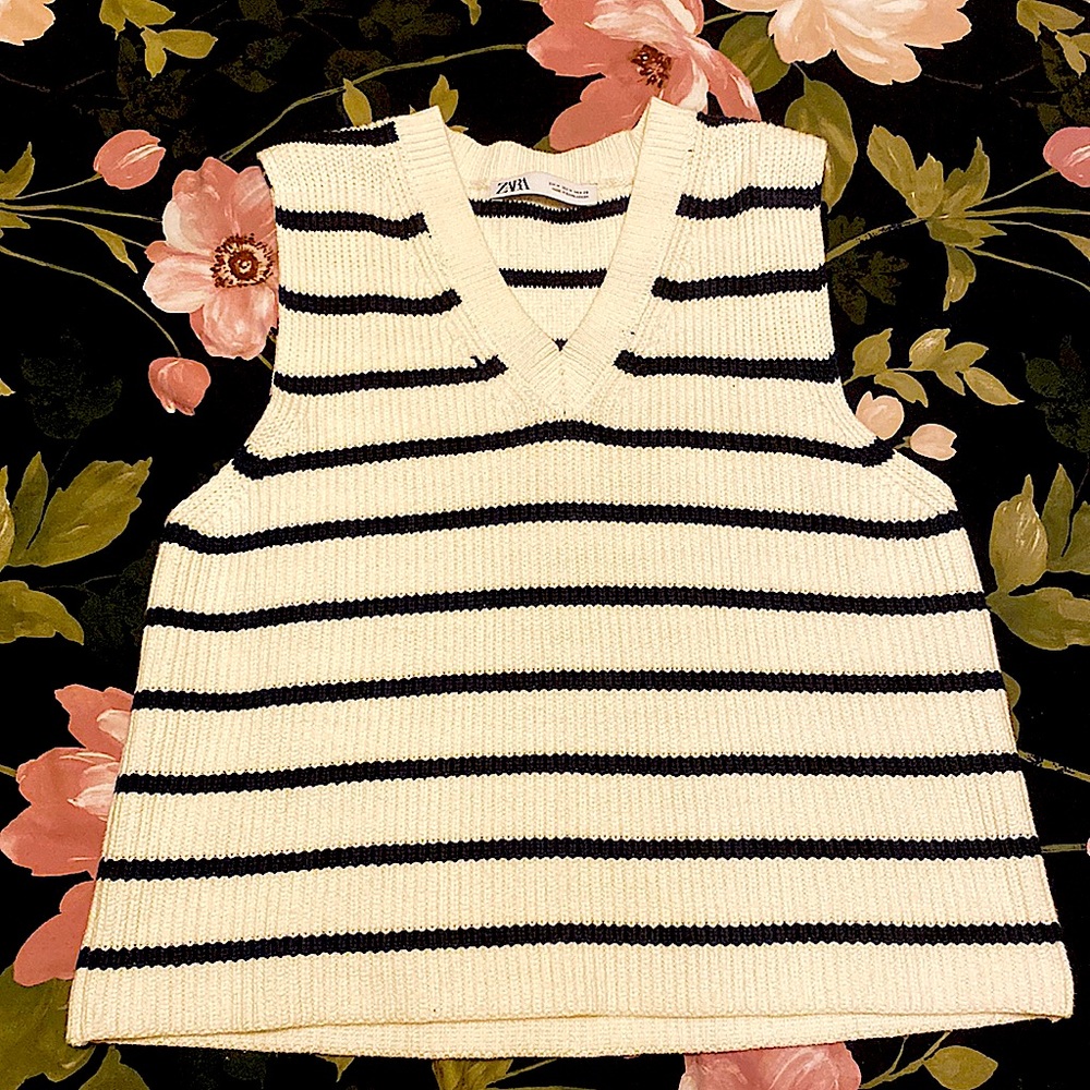 A sleeveless sweather from zara